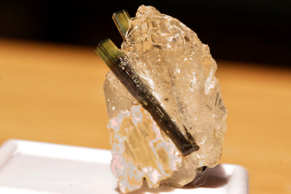 Green Cap tourmaline crystal on quartz