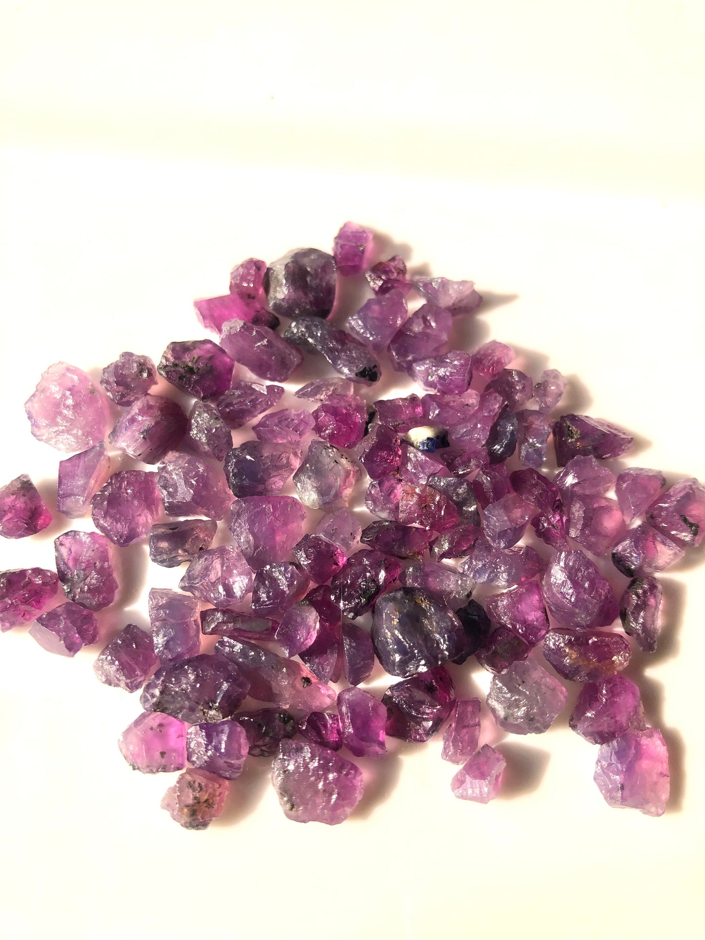 100 carats Facet Rough Parcel of Purplish Raw Sapphires