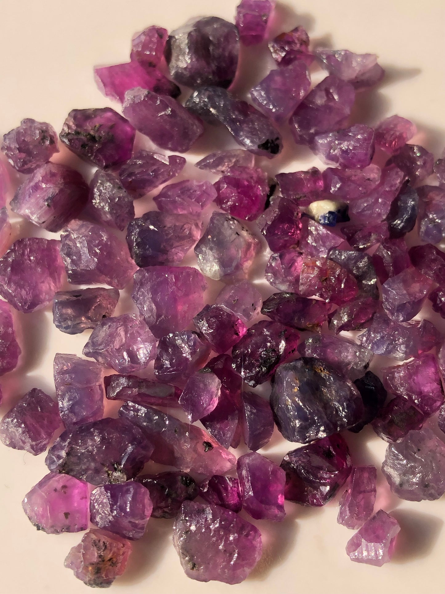 100 carats Facet Rough Parcel of Purplish Raw Sapphires