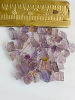 grab purple scapolite gemstones
