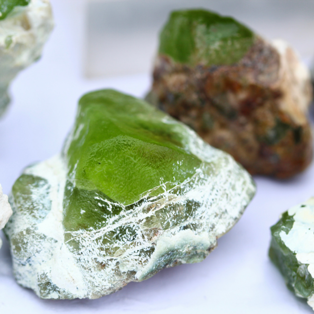 Natural Rough Peridots on Feldespar