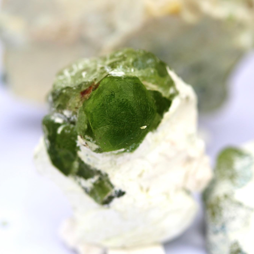 Natural Peridot Crystals on Feldespar