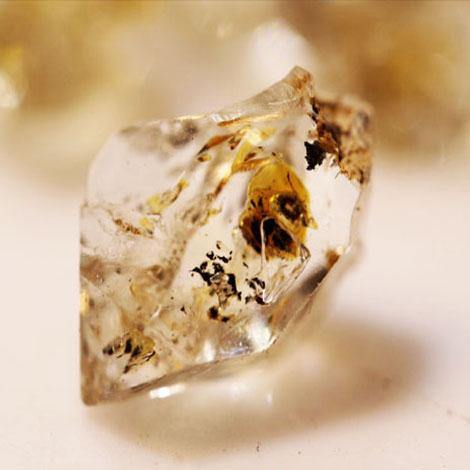 141carat Natural Double Terminated Quartz Crystal with Petroleum Inclusion.