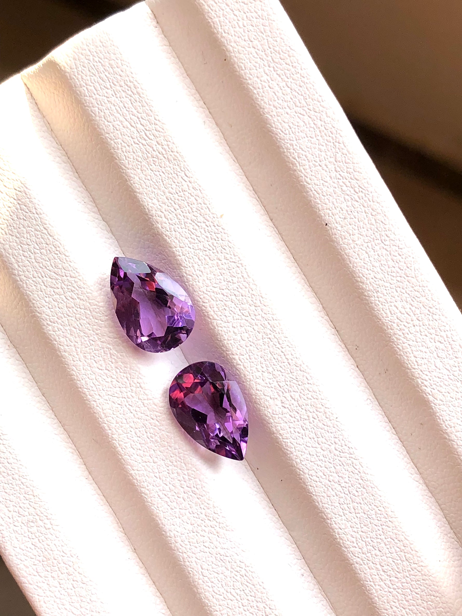 6.3 carat pear cut amethyst gemstone pair