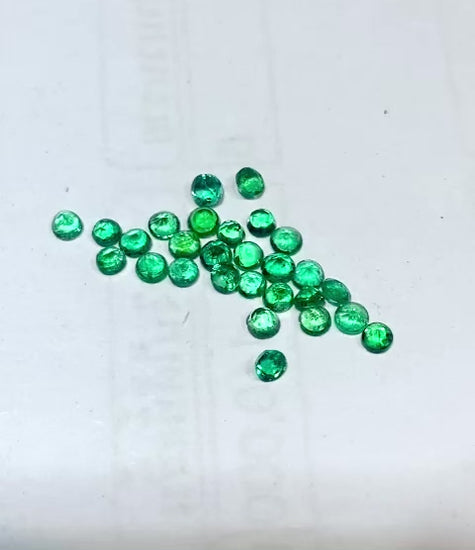 Round Brilliant Diamond Cut Emeralds