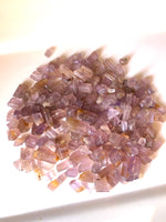 Wholesale purple scapolite raw stones